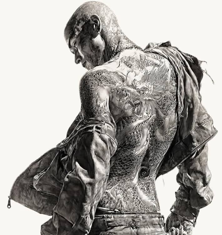 A monochrome portrait of a man turning over his shoulder, with a dragon tattoo across his back.